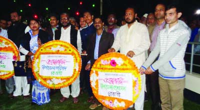 BETAGI(Bauguna): Upazila Parishad and Administration, Betagi placing wreaths at Central Shaheed Minar in Poura town on the occasion of the International Mother Language Day on Wednesday.