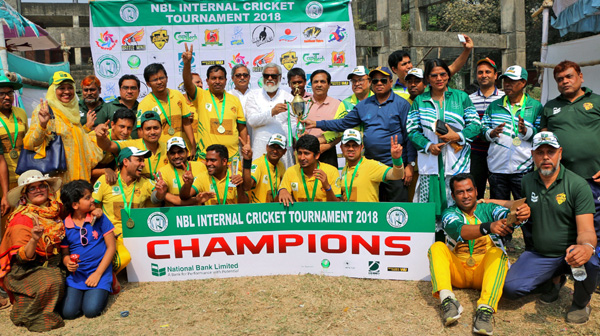 Members of CAD Challengers, who became champions of NBL Internal Cricket Tournament pose for photo with the trophy and officials at Dhaka University Central Ground on Friday (Feb 23). In the final CAD Challengers defeated Western Spirit by 7 wickets.