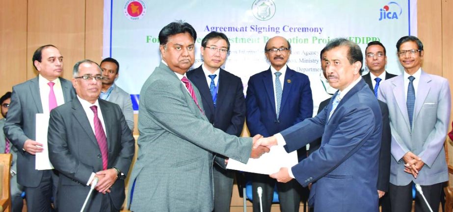 Mosleh Uddin Ahmed, Managing Director of NCC Bank and Md. Rezaul Islam, GM of Bangladesh Bank sign for "Foreign Direct Investment Promotion Project (FDIPP)" at Bangladesh Bank office recently. Under this agreement, NCC Bank will be able to utilize Two