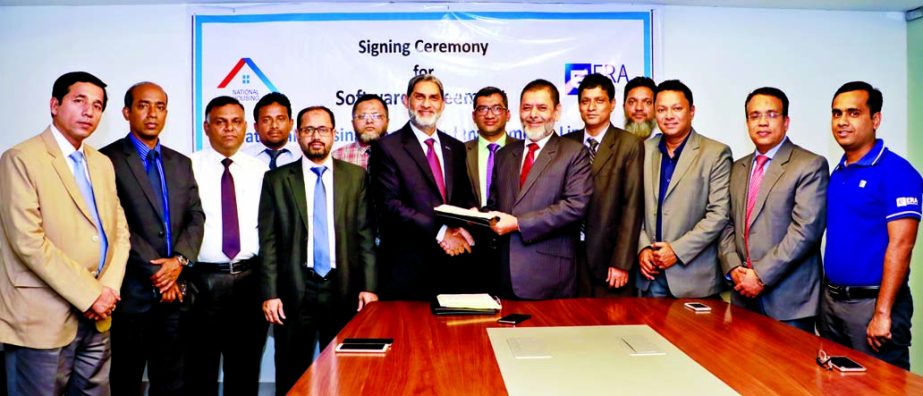 Md.Khalilur Rahman, Managing Director of National Housing Finance and Investments Limited (NHFIL) and Md. Serajul Islam, CEO of ERA InfoTech, exchanging an agreement signing documents for supplying NBFI core software, loan originating, approval Payroll So