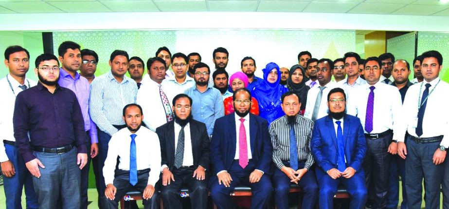 Md. Habibur Rahman, Managing Director of Al-Arafah Islami Bank Limited, poses with the participants of a weeklong training programme on 'Investment Operation and Management' for its executive officer at its Training and Research Institute' in the city