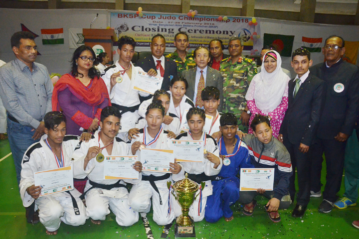 Nepal Judo team, the champions of the BKSP Cup Judo Championship with the chief guest Bhutanese Ambassador to Bangladesh Sonam Tobden Rabgye and the special guest Director General of BKSP Brigadier General Md Shamsur Rahman and the other officials of BKSP