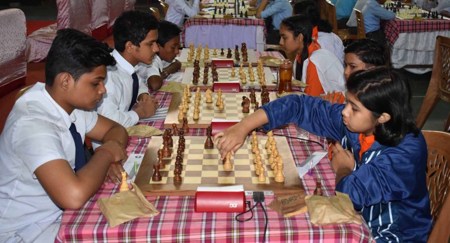 A scene from the fourth round matches of the CJKS-Kwality Ice Cream Inter-School Team Chess Tournament at the Gymnasium in the MA Aziz Stadium, Chittagong on Wednesday.