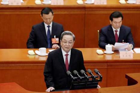 Yu Zhengsheng, chairman of the Chinese People's Political Consultative Conference (CPPCC), speaks at the CPPCC's opening session at the Great Hall of the People in Beijing on Saturday.