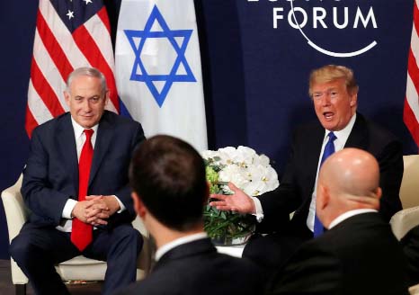 U.S. President Donald Trump speaks with Israeli Prime Minister Benjamin Netanyahu during the World Economic Forum (WEF) annual meeting in Davos, Switzerland.