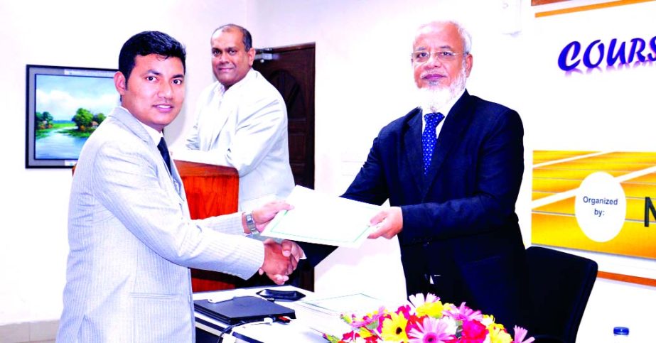 Md. Humayun Kabir, Principal of National Bank Training Institute, handing over certificates among the participants of 10 days long course on "Credit Operation and Risk Management" in the concluding ceremony at its Training Institute in the city recentl