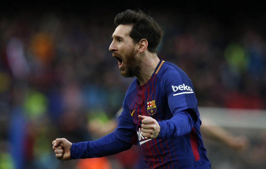 FC Barcelona's Lionel Messi reacts after scoring during the Spanish La Liga soccer match between FC Barcelona and Atletico Madrid at the Camp Nou stadium in Barcelona, Spain on Sunday.