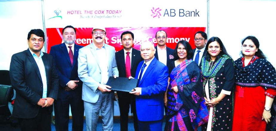 Moshiur Rahman Chowdhury, Managing Director of AB Bank Limited and Mohiuddin Khan Khokon, Director (Sales & Marketing) of Hotel The Cox Today, (Cox's Bazar), exchanging an agreement signing at the bank head office in the city recently. Under the deal, De