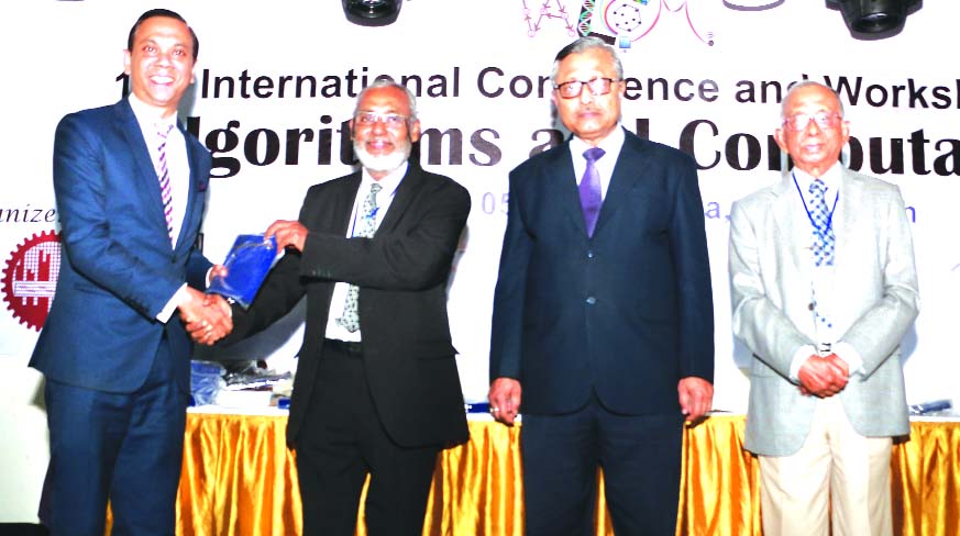 Mominul Islam, Managing Director of IPDC Finance Limited, receiving a crest from Professor M Shamsher Ali, Fellow of Bangladesh Academy of Sciences (BAS) in the gala event of WALCOM 2018 at Dhaka Club on Tuesday. Professor Dr. Saiful Islam, Vice-Chancel