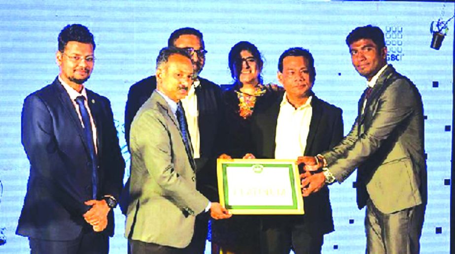Nahid Sarwar, Managing Director and owner of Cityscape Tower Ltd, receiving a commercial PLATINUM Award for outstanding contribution in Energy and Environmental Design (LEED) of Green Building System from P. Gopala Krishnan, Managing Director, Asia Pacifi