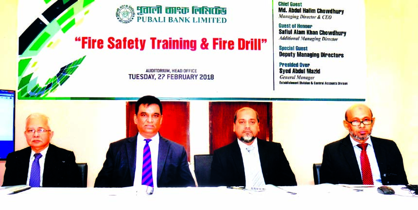 Md. Abdul Halim Chowdhury, Managing Director of Pubali Bank Limited, presiding over a training course on 'Fire Safety Training and Fire Drill' at the bank's head office in the city recently. Mohammad Ali and Akhtar Hamid Khan, DMDs of the bank were als