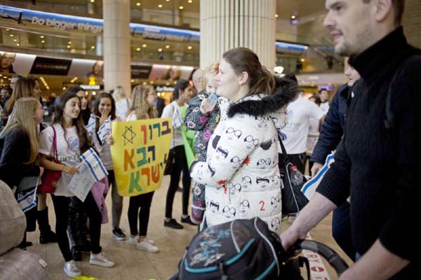 New Jewish immigrants from the Ukraine arrive on a flight funded by the International Fellowship of Christians and Jews at the Ben Gurion airport near Tel Aviv, Israel.