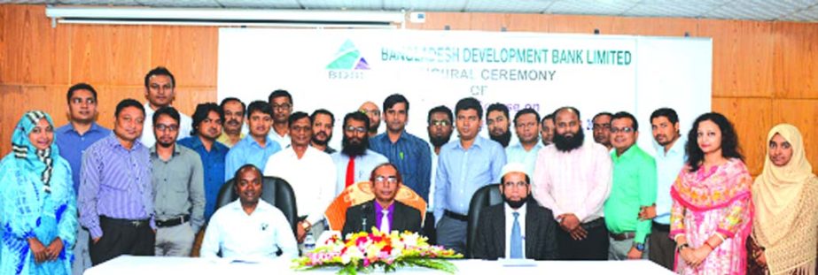 Manjur Ahmed, Managing Director of Bangladesh Development Bank Limited (BDBL), poses with the participants of a 3 days long training course on "Documentation, Stamping, Creation of Charges and Artharin Adalat Ain, 2003 and 2013" at the banks Training I