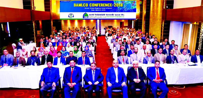 Abu Hena Mohd. Razee Hassan, Deputy Governor of Bangladesh Bank, poses with the participants of BAMLCO Conference-2018 as chief guest of First Security Islami Bank Limited, at the Training Institute in the city on Friday. Syed Waseque Md. Ali, Managing Di