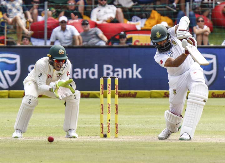 South Africa's Hashim Amla plays a ball at the wicket on the second day of the second cricket Test between South Africa and Australia at St. George's Park in Port Elizabeth, South Africa on Saturday.