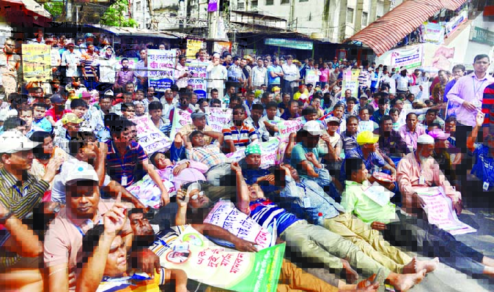 Thousands of employees and officials of 329 Pourashavas of the country staged a sit-in organised by Bangladesh Pourashava Service Association (BPSA) demanding payment of their arrears and salary from Govt revenue fund. This photo was taken from in front o