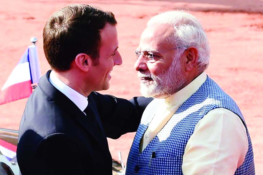 Modi broke protocol to receive Macron and his wife Brigitte at the airport.
