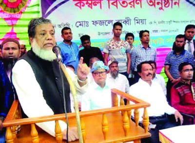 SAGHATA (Gaibandha): Deputy Speaker of Jatiya Sangsad Adv Fazley Rabbi Miah MP speaking at a blankets distribution programme organised by Saghata Samity, Dhaka at Saghata Upazila Parishad premises on Saturday.