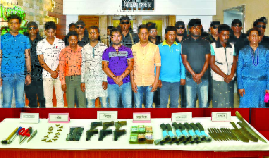 RAB members nabbed ten persons involved in kidnapping two for ransom from Harirampur area in Manikganj. They also recovered pistols and chapati from their possessions. The snap was taken from Media Center on Monday.