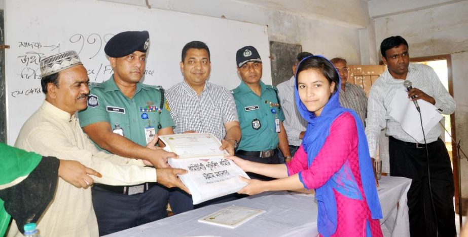 Mohammed Faruque Ul Hoque, Assistant Police Commissioner, Pahartoli Zone, distributing prize and certificate among the winners of essay competition , Members of the Comunity policing was present during the prize giving ceremony.