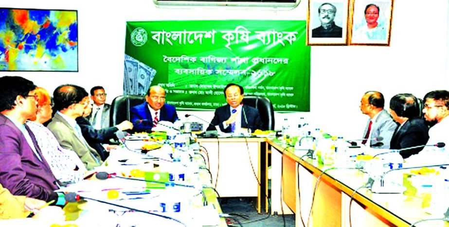 Mohammad Ismail, Chairman of Bangladesh Krishi Bank, addressing at a conference for its Foreign Exchange Branch Heads at the bank's head office in the city recently. Md. Ali Hossain Prodhania, Managing Director and other senior officials of the bank were