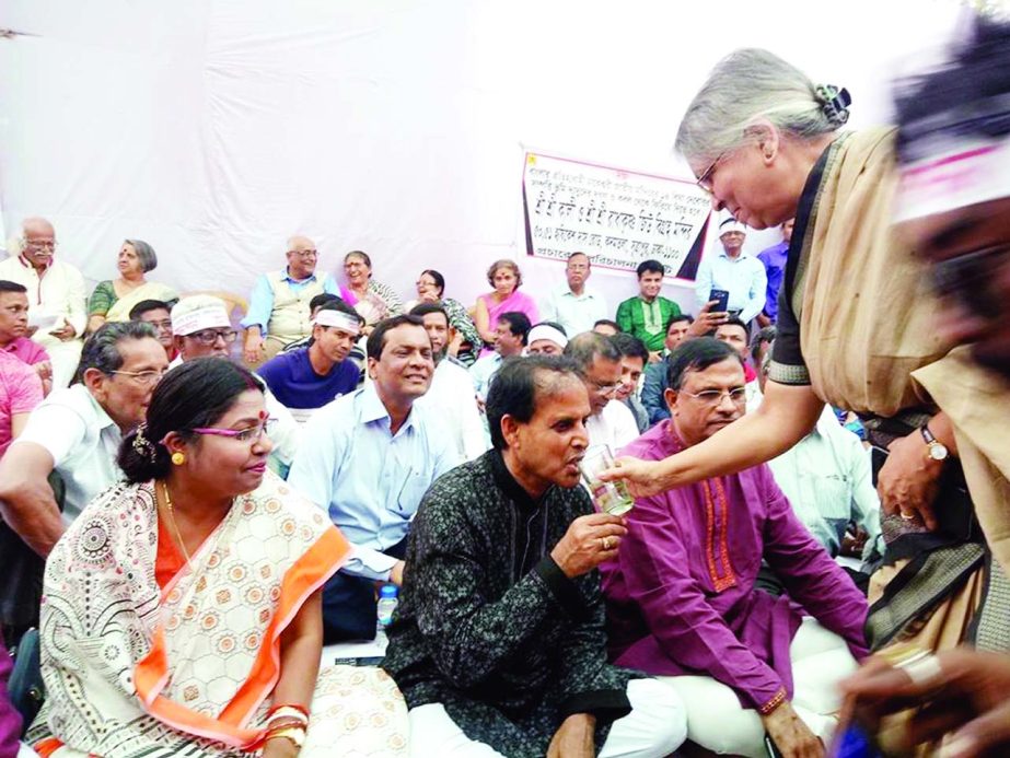 Former Adviser to the Caretaker Government Sultana Kamal on Friday breaking the hunger strike by drenching 'sarbat' to the hunger striking people who staged the programme with a call to recover occupied land of Shri Shri Dhakeshwari Jatiya Mandir.