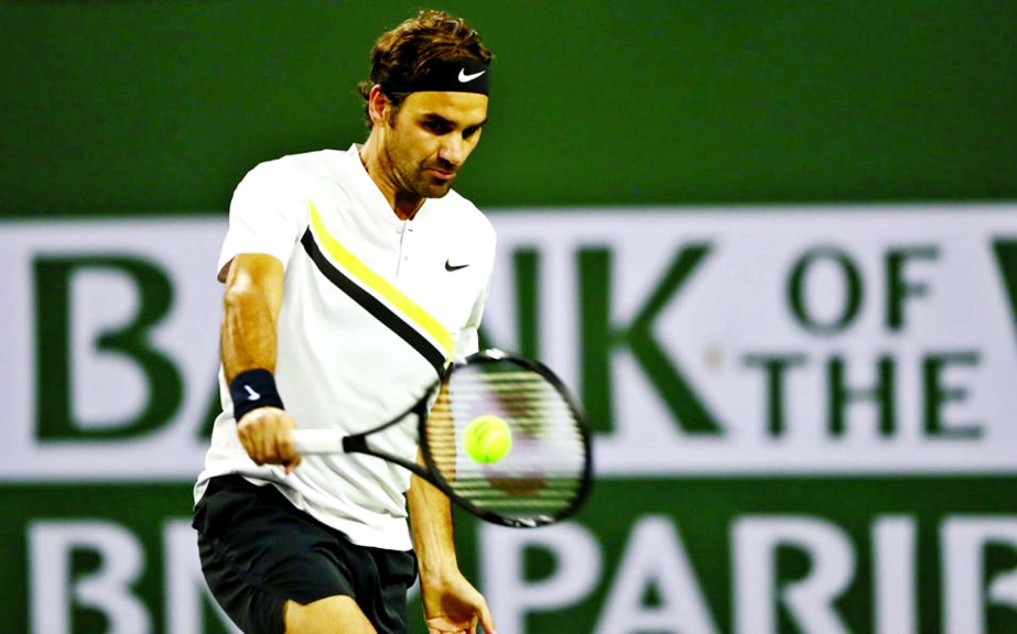 Roger Federer of Switzerland returns a shot to Hyeon Chung of Korea during of the BNP Paribas Open at the Indian Wells Tennis Garden on Thursday in Indian Wells, California.