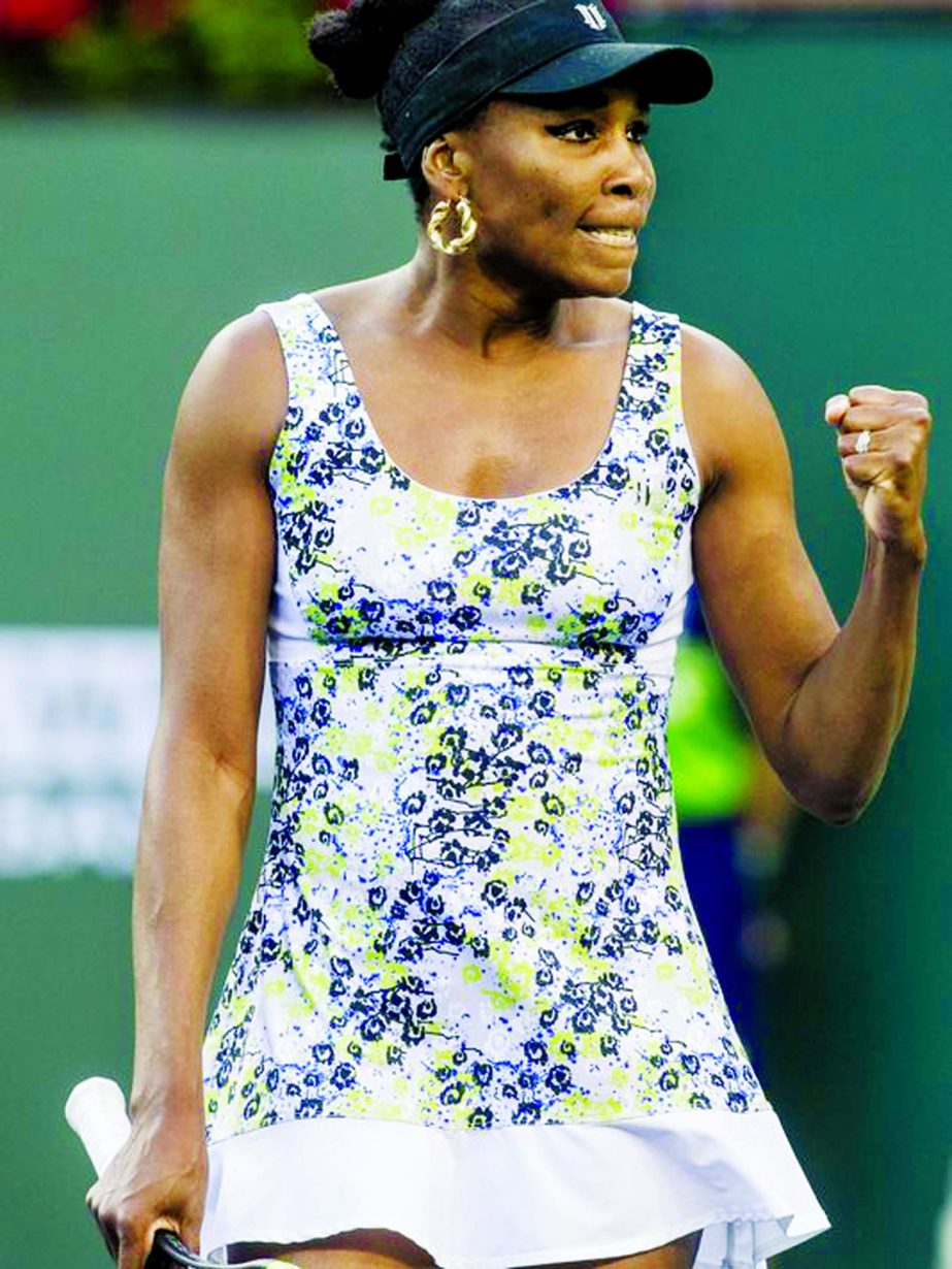 Venus Williams of the United States of America celebrates a break point against Carla Suarez Navarro of Spain on Stadium One during their quarterfinal match at the 2018 BNP Paribas Open at Indian Wells Tennis Garden on Thursday. Williams won the match 6-3