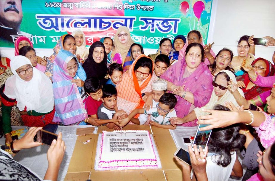 Hasina Mohiuddin, President , Chittagong Mahila Awami League cutting cake on the occasion of 98th birth anniversary of Bangabandhu Sheikh Mujibur Rahman yesterday.