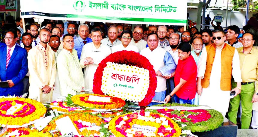 Arastoo Khan, Chairman of Islami Bank Bangladesh Limited, paying tribute by placing wreath to the portrait of Bangabandhu Sheikh Mujibur Rahman marking his birth day on Saturday at 32 No. Road, Dhanmondi. Major Gen. (Retd.) Engr. Abdul Matin, EC Chairman,