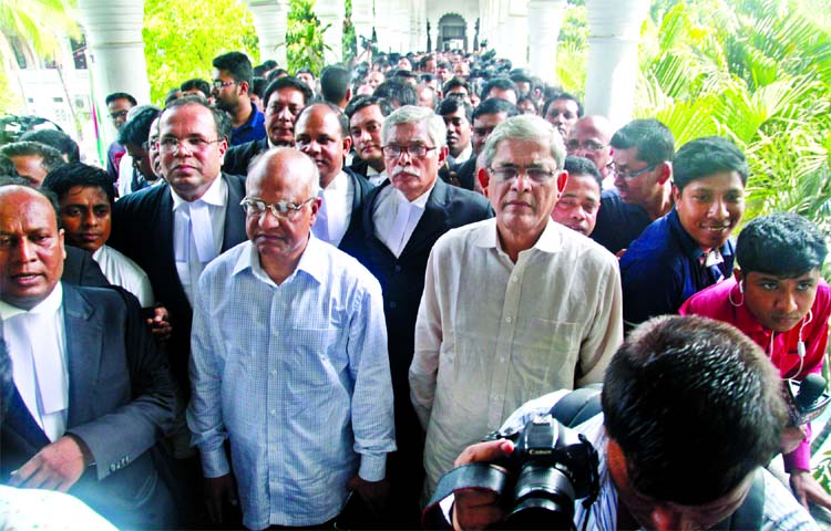 BNP Secretary General Mirza Fakhrul Islam Alamgir, senior leaders along with lawyers came out from the court premises just after hearing on Khaleda Zia's case on Sunday.