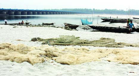 LALMONIRHAT: Fishing nets and boats remain useless as Teesta River has turned into a barren sand land. This picture was taken from Teesta Barrage area in Hatibandha Upazila under Nilphamari on Sunday.