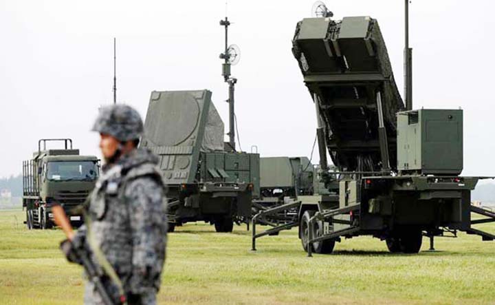 A Japan Self-Defense Forces (JSDF) soldier takes part in a drill to mobilise their Patriot Advanced Capability-3 (PAC-3) missile unit in response to a recent missile launch by North Korea, at U.S. Air Force Yokota Air Base in Fussa on the outskirts of Tok