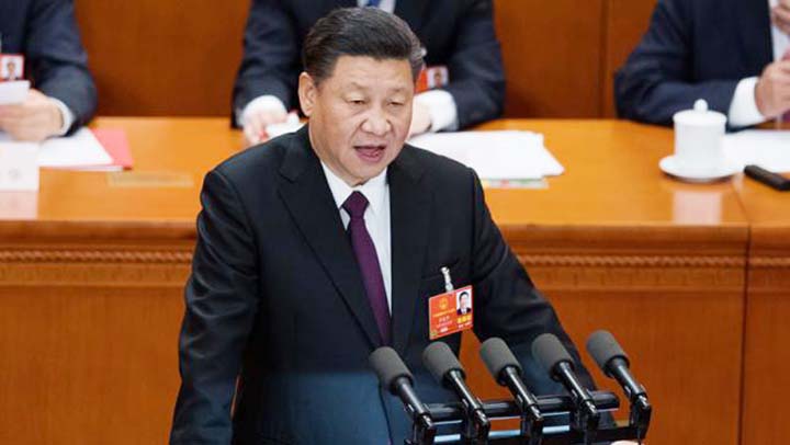 Chinese President Xi Jinping delivers a speech during the closing session of the National People's Congress at the Great Hall of the People in Beijing on Tuesday..