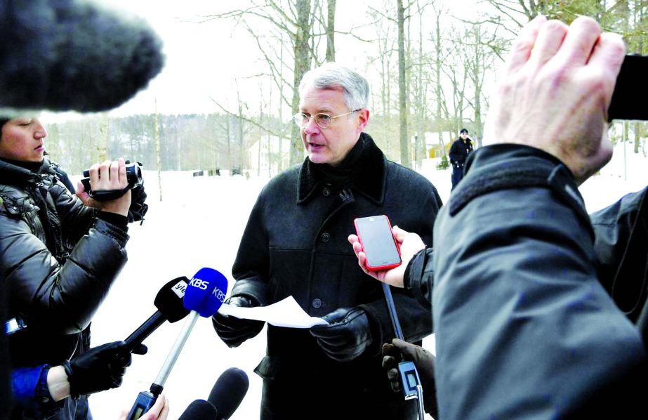 Director General Kimmo Lahdevirta from the Ministry for Foreign Affairs of Finland reads out a press statement concerning the meeting on Northeast Asian issues at the Konigstedt Manor, in Vantaa, Finland on Wednesday.