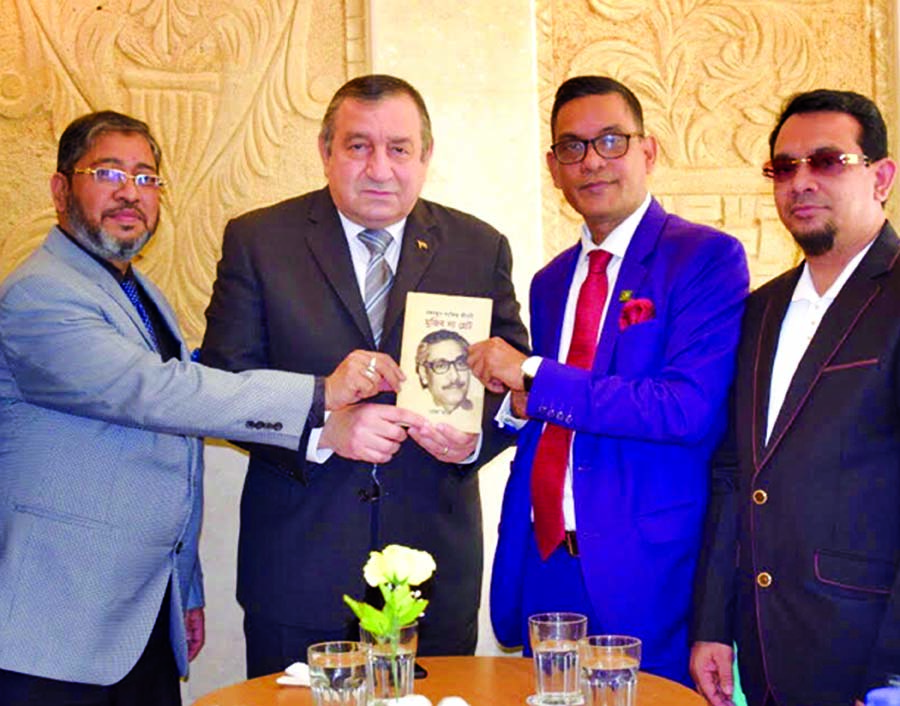 A delegation of Bangladesh-Egypt Friendship Association (BEFA) presenting a book on Father of the Nation Bangabandhu Sheikh Mujibur Rahman to former Prime Minister of Egypt Prof. Dr. Essam Sharaf (2nd from left) at a function held in a Cairo hotel recentl