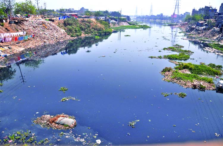 Encroachers illegally occupying the major portion of both sides of once mighty tributaries of Buriganga River. But the authorities concerned kept their eyes shut to take any steps to restore the losing parts and its beautification. This photo was taken fr
