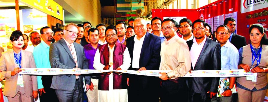 Civil Aviation and Tourism Minister AKM Shajahan Kamal, inaugurating the 3-day International Tourism Fair at the city's Pan Pacific Sonargaon Hotel on Thursday. Kazi Wahidul Alam, organiser of the fair among others were also present.