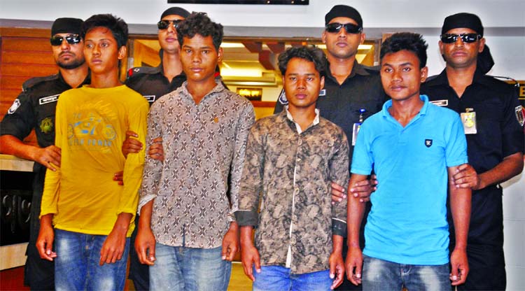 RAB team on secret information arrested four youths including mastermind and killer Sanjeeb Chiran from Nalitabari of Sherpur for killing Garo mother and daughter in Gulshan. This photo was taken from RAB media center on Thursday.