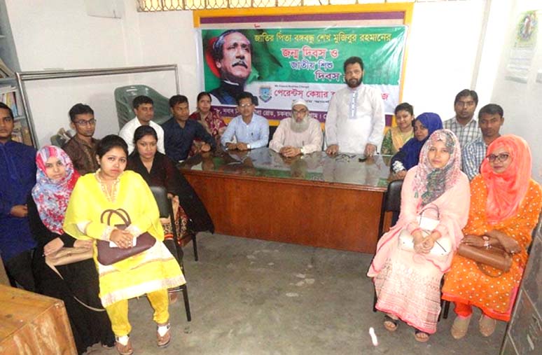 Principal of Parents Care School & College Md Nurul Islam addressing a discussion meeting on birth anniversary of Bangabandhu and National Children's Day at college premises recently.