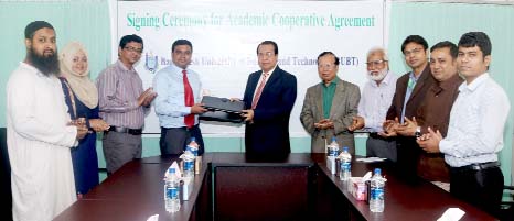 Prof Md. Abu Saleh, Vice Chancellor, BUBT and Md. Saifur Rahman Rony, Proprietor, RNR Bazar exchanging documents after signing a MoU at the Uiversity campus on Wednesday.