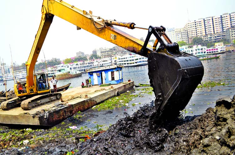 BIWTA authority started cleaning siltation and removal of garbages from the Buriganga river. This photo was taken from Sadarghat Terminal area on Friday.