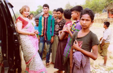 Nazmun Nesa Piari , President, Bengal Centre talking to Rohingya children during her visit to Rohingya camps in Cox's Bazar recently.