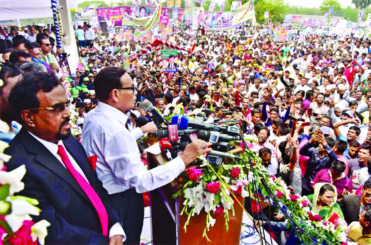 Jatiya Party Chairman Hussain Muhammad Ershad addressing the grand rally held at city's Suhrawardy Uddyan on Saturday.