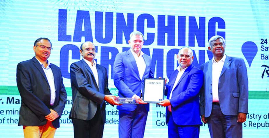 Joerg Mommertz, Chairman and Managing Director of Man India handing over a certificate to Md. Mujibur Rahman, Managing Director of Powervission Limited, at a launching ceremony at a city hotel on Saturday. PowerVision is selected as authorized sole distri