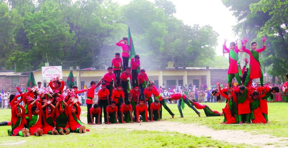 BHOLA: Students of Borhanuddin High School participating in a display on the occasion of the Independence and National Day on Monday.