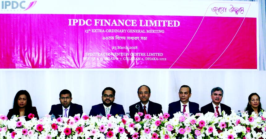 Dr. Muhammad Musa, Chairperson of IPDC Finance Limited, presiding over its 13th EGM and 36th AGM at a convention centre in the city recently. Mominul Islam, Managing Director, Samiul Hashim, Company Secretary and other senior officials of the company were