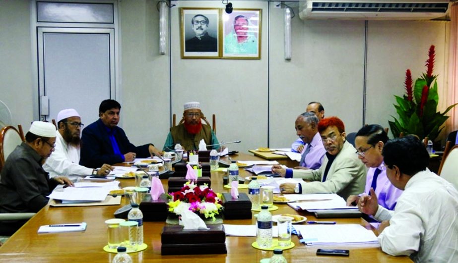 Md. Ataur Rahman, Member ot the Sariah Supervisory Committee of Sonali Bank Limited, presiding over its 17th meeting at the bank head office in the city recently. Hafez Moulana Mustafizur Rahman, member of the committee, Dr. Md. Nurul Alam Talukder, Direc