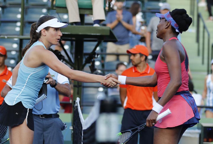 Venus Williams (right) shakes hands with Johanna Konta of Germany after defeating her 5-7, 6-1, 6-2 during the Miami Open tennis tournament in Key Biscayne, Fla.on Monday.