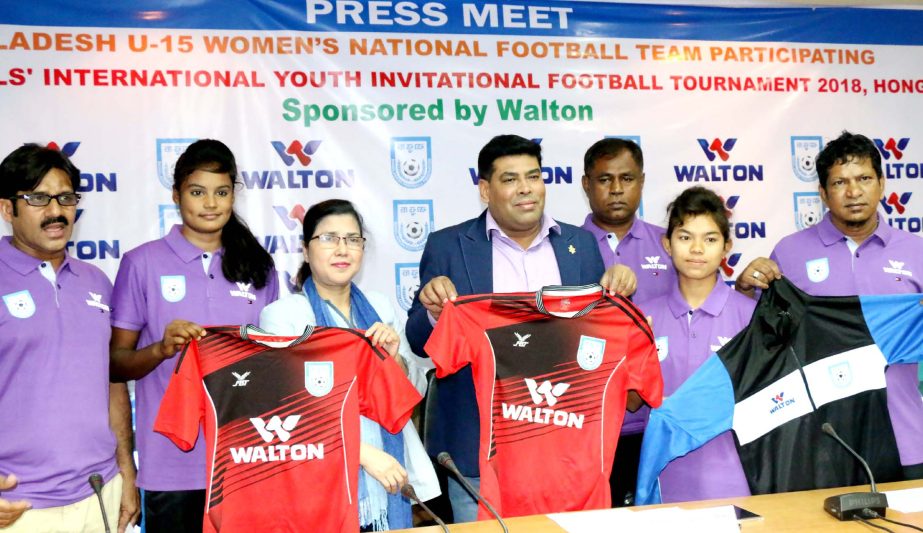 Members of Hong Kong-bound Bangladesh National Under-15 Women's Football team with the Chairperson of Women's Football Committee of BFF Mahfuza Akter Kiron, Senior Operative Director (Head of Games & Sports) of Walton Group FM Iqbal Bin Anwar Dawn showi